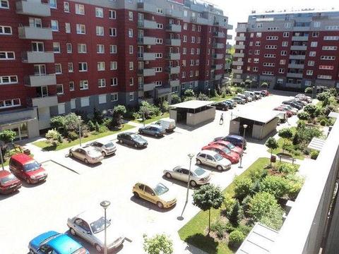 Wynajmę w Centrum w nowym Apartamentowcu 2 pok. 52 m² rozkładowe, osobna kuchnia, balkon